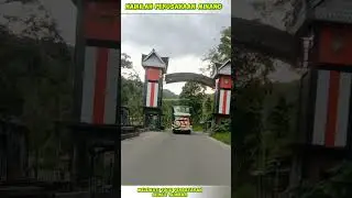 BUS NPM MELEWATI GAPURA PERBATASAN SUMUT SUMBAR