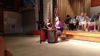 Mikayla Fishgold playing ashiko drum
