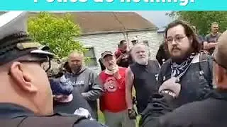 Cops stand by as protester is attacked in Ohio