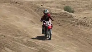 Danny jumping Honda CRF70 at LEMX's 60/80 Track
