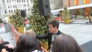 Cameron Dallas posing with fans before leaving The Today Show in New York