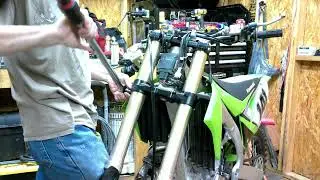 Motocross bike steering stem bearing greasing