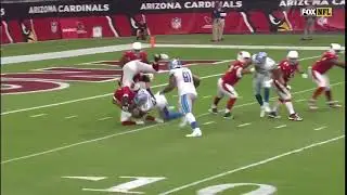 Cardinals offensive lineman JR Sweezy helps the Lions sack Kyler Murray