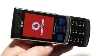 LG KF750 Крутой телефон 2008 года с Закаленным стеклом. Сенсорная клавиатура и Карбоновый корпус