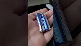 how to charge your iPhone with two AA batteries #shorts #howto