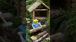 Tiny Workers in the Forest &ndash; Miniature Toy Robots Build in Nature