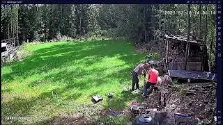 Installing a screwpile with a power drill and reduction gear.