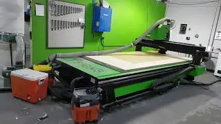Hold-down parts on 5ft x 10ft CNC router using shop Vacuum