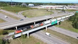 Awesome Aerial 4K Video! Long Local Train CN 537 Crossing Viaduct over Highway at Moncton, NB