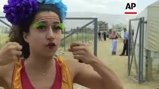 Clowns bring cheer to Syrian refugee children - AP Archive