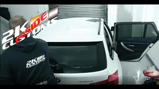 Window tinting on a BMW 320D with Llumar tint