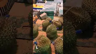 selling durian fruit at super market in china