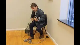 Brad Craig playing a guitar he made from scratch