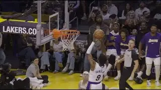 Bronny James soars for the two-handed alley-oop dunk off a lob by Austin Reaves