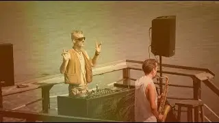 Incredible music live set. DJ standing on nails for the whole time.