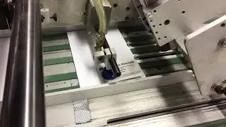 Card affixing machine
