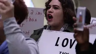 Protesters rally at McCarran against Trump travel ban on immigrants, refugees