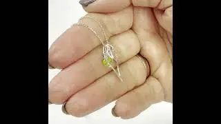 personalised open heart necklace with an initial and august birthstone charms