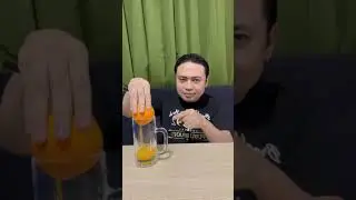 Two hands squeezed me before I did the magic orange pour trick. #creativevideo #comedy #funny