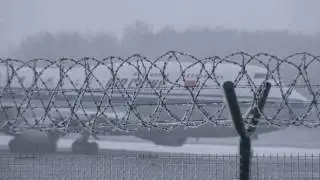 Air China Boeing 747 B-2447 takes off during heavy snow and fog in Vilnius