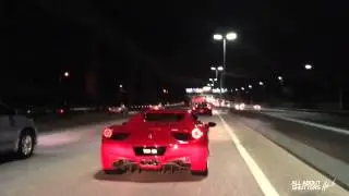 Two Ferrari 458 Spyders at Kesas Highway, Malaysia