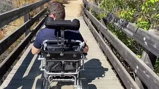 Driving off-road Ranger Maestro Reclinable Wheelchair Over On a Trail Thru Sand- Gravel- Threshold