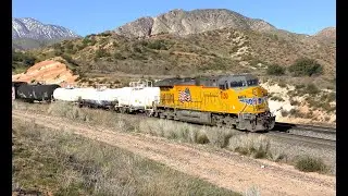 UNION PACIFIC Solo DPU brings the rear of tank cars over Cajon Wash bridge in Cajon Pass CA