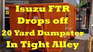 ISUZU FTR Drops 20 Yard  Dumpster on tight  alley street