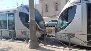 The Jerusalem light rail pass at the french ST. Louis hospital in Jerusalem