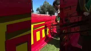 Painting the Pirelli barriers at Albert Park #Shorts #F1 #AusGp