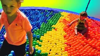 RAINBOW BALL PIT KIDS ON TRAMPOLINE