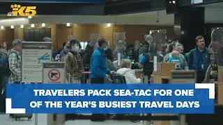 Travelers head to Sea-Tac for one of the busiest travel days of the year