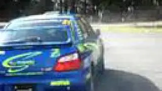Toshi Arai drives impreza rally car.