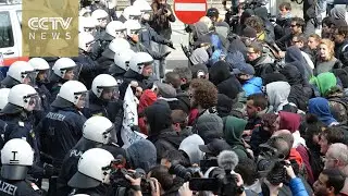 Austrian police clash with people protesting border closures