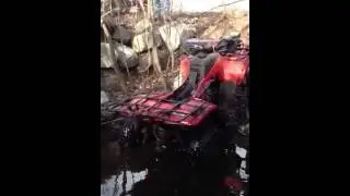 Atv sinks in deep pond