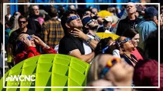 A total solar eclipse races across North America as clouds part along totality
