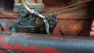 Ford 8N tractor fuel problem shown at carburetor