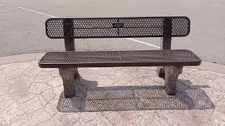 Memorial park bench at a park in Iowa in Summer.
