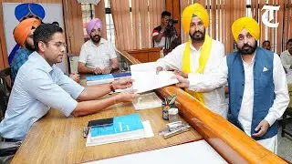 CM Bhagwant Mann with AAP nominee for Sangrur LS bypoll Gurmail Singh as the latter files his papers