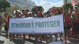 Indigenous Brazilians protest a proposed law that limits their lands | AFP