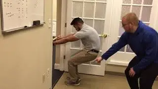 Squatting Bar Reverse Reach