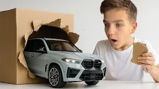 Марк получает в коллекцию гигантскую модель BMW X5M масштабом 1:18