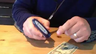 Counterfeit money detector