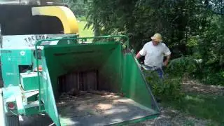 At FloydFest, mulching up some dead tree parts