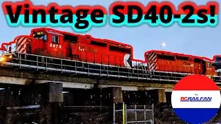 A pair of vintage GMD SD40-2s pull CP V89 at the southeastern end leg of the Fraser River Bridge!