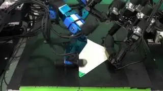 Robotic Origami Folding With Dynamic Motion Primitives