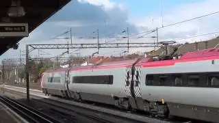 UK: Virgin West Coast Pendolinos pass South Kenton, North London 13/03/13
