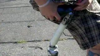 Amputee RAK Mowing Lawn Prosthetic On