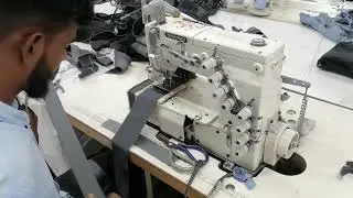 Sewing Operator in garments  industry of Bangladesh.Process - Belt Make.
