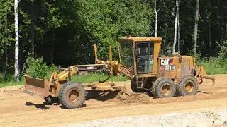 Cat 160H grading sand
